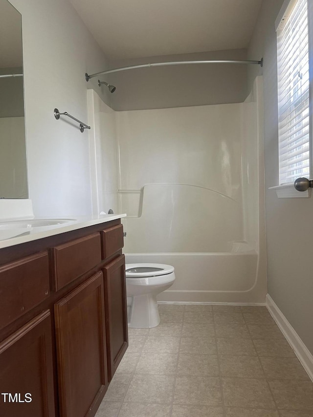 2118 Kedvale Ave, Raleigh, NC 27617 - full bathroom with  shower combination, vanity, toilet, tile patterned floors, and baseboards