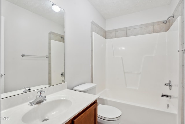 128 Newton Ct, Raeford, NC 28376 - full bath featuring vanity, toilet, shower / washtub combination, and a textured ceiling