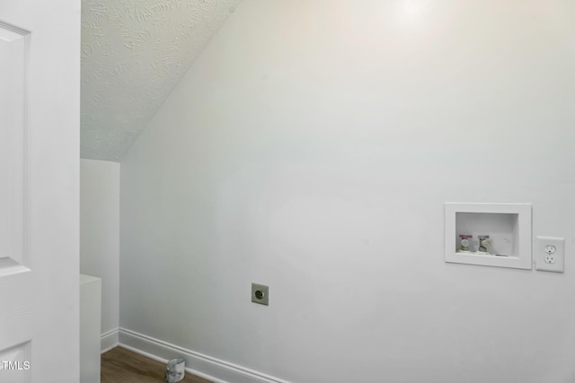 128 Newton Ct, Raeford, NC 28376 - washroom with electric dryer hookup, hookup for a washing machine, a textured ceiling, baseboards, and wood finished floors