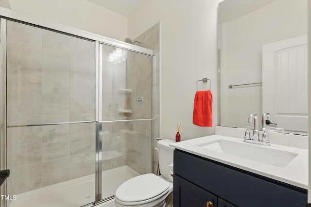 187 Harpers Landing Rd, Garner, NC 27529 - bathroom with vanity, toilet, and a stall shower