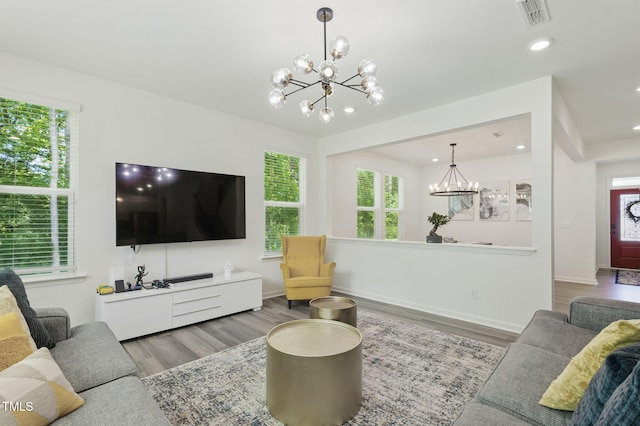 187 Harpers Landing Rd, Garner, NC 27529 - living area featuring a chandelier, wood finished floors, recessed lighting, and baseboards