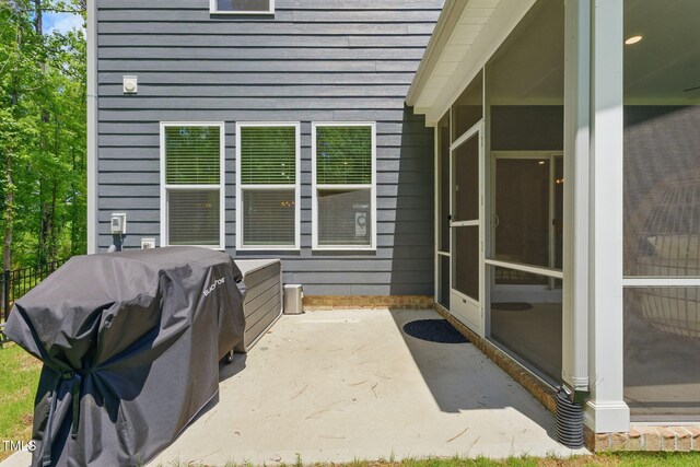 187 Harpers Landing Rd, Garner, NC 27529 - view of patio with area for grilling and a sunroom