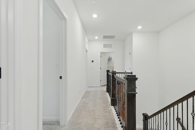 187 Harpers Landing Rd, Garner, NC 27529 - corridor featuring an upstairs landing, recessed lighting, light carpet, and baseboards