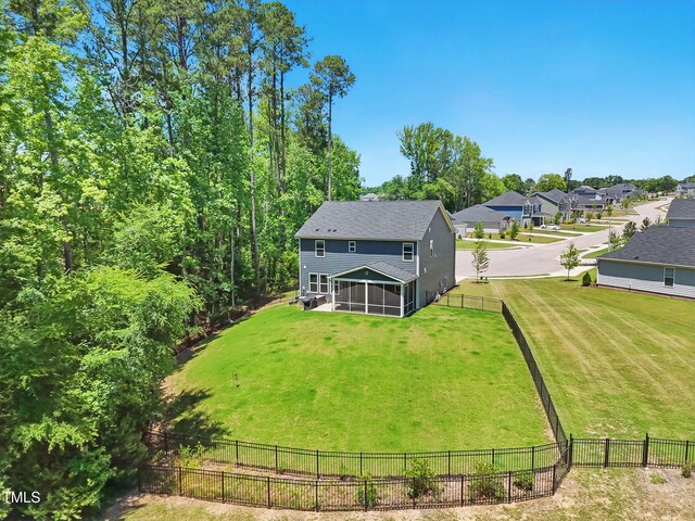 187 Harpers Landing Rd, Garner, NC 27529 - rear view of property with a sunroom