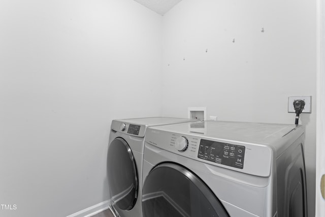 107 Woolard Way, Apex, NC 27502 - washroom with independent washer and dryer and baseboards