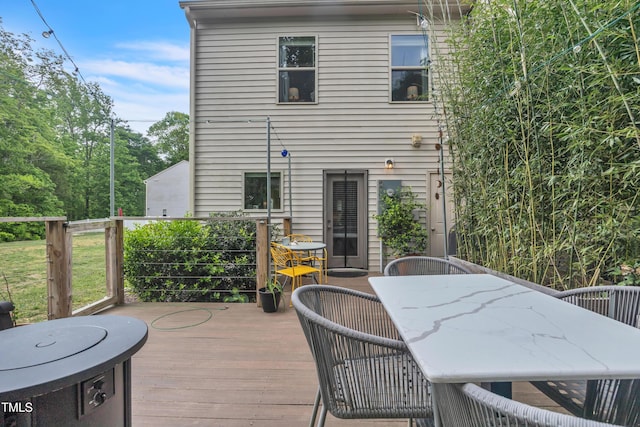 537 Hobkirks Pl, Durham, NC 27704 - wooden deck featuring outdoor dining area