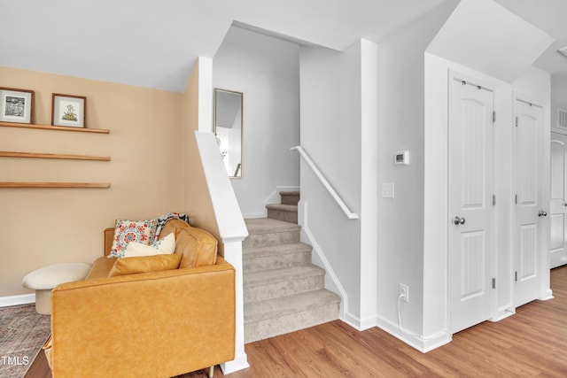 537 Hobkirks Pl, Durham, NC 27704 - stairway featuring wood finished floors and baseboards