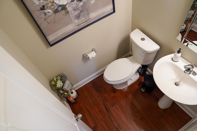 825 Fulworth Ave, Wake Forest, NC 27587 - half bathroom with wood finished floors and toilet