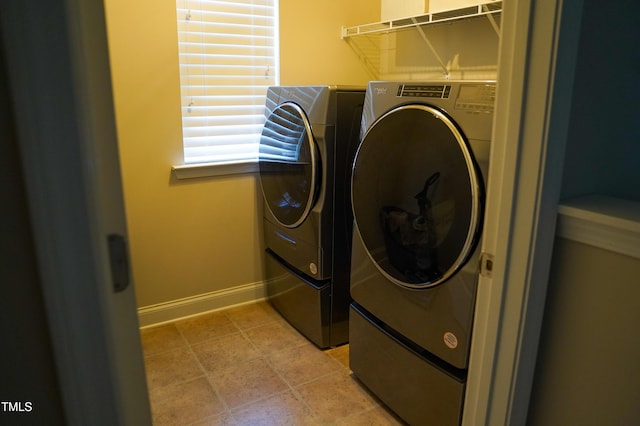 825 Fulworth Ave, Wake Forest, NC 27587 - washroom with washing machine and clothes dryer and baseboards