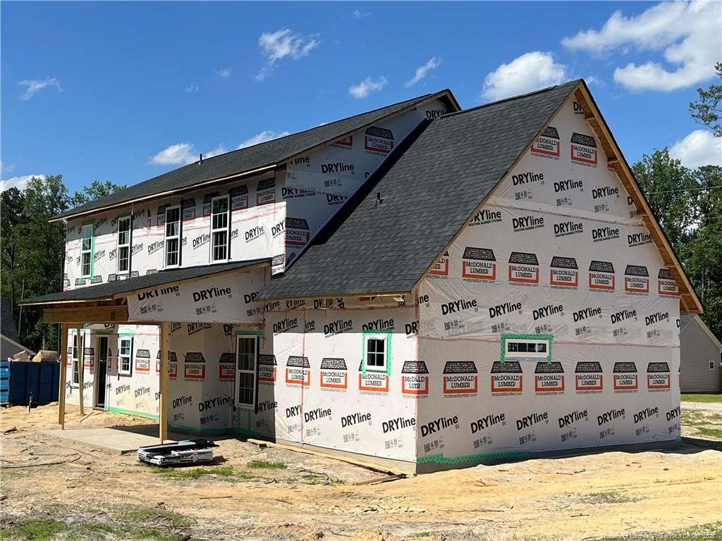 157 Edgar Way, Raeford, NC 28376 - view of property exterior featuring a shingled roof