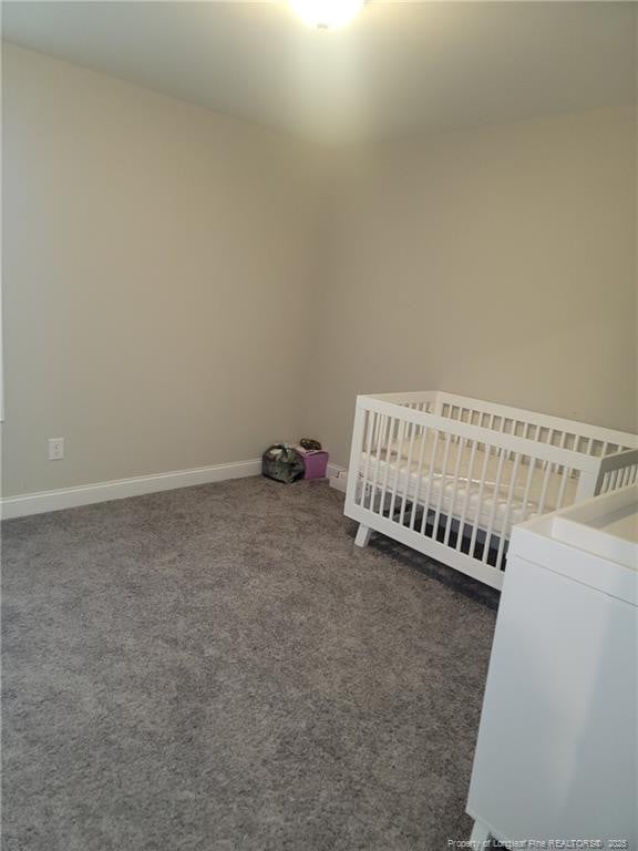 112 Nairn St, Fayetteville, NC 28311 - carpeted bedroom with baseboards