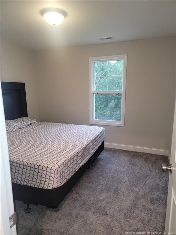 112 Nairn St, Fayetteville, NC 28311 - carpeted bedroom with baseboards