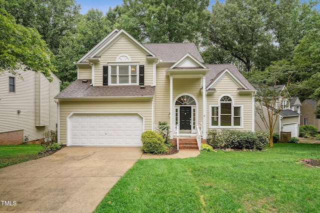 111 Catherwood Pl, Cary, NC 27518 - traditional-style home featuring a garage, roof with shingles, a front lawn, and concrete driveway