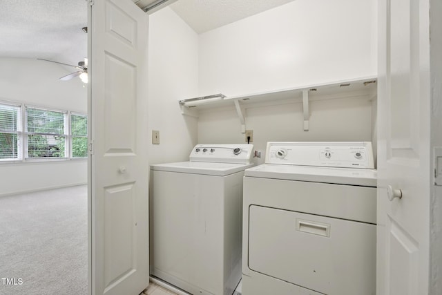 111 Catherwood Pl, Cary, NC 27518 - washroom with washing machine and dryer, light colored carpet, ceiling fan, and a textured ceiling