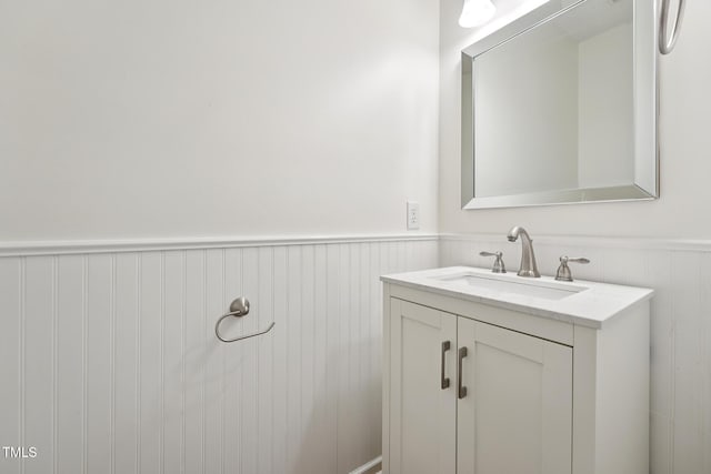 111 Catherwood Pl, Cary, NC 27518 - bathroom featuring a wainscoted wall and vanity