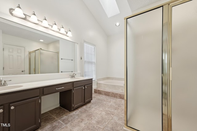 111 Catherwood Pl, Cary, NC 27518 - bathroom featuring a skylight, a shower stall, double vanity, a garden tub, and tile patterned flooring