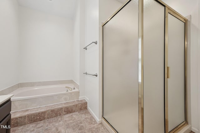 111 Catherwood Pl, Cary, NC 27518 - bathroom featuring vanity, a stall shower, and a bath