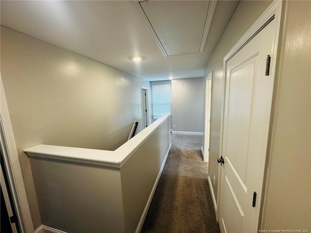 4179 Overhills Rd, Spring Lake, NC 28390 - corridor with attic access, dark colored carpet, an upstairs landing, and baseboards