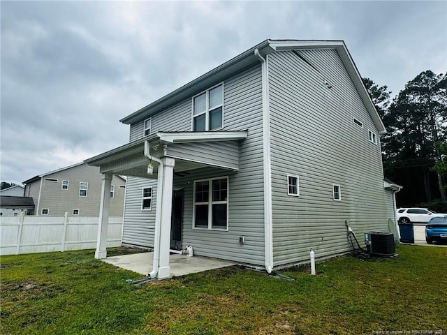 4179 Overhills Rd, Spring Lake, NC 28390 - rear view of property featuring a patio area and central AC