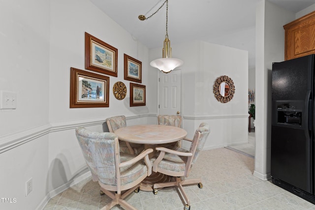 2313 Filigree Ct, Raleigh, NC 27614 - dining space featuring light tile patterned flooring and baseboards