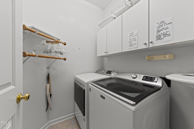 2313 Filigree Ct, Raleigh, NC 27614 - washroom featuring washer and clothes dryer, cabinet space, and baseboards