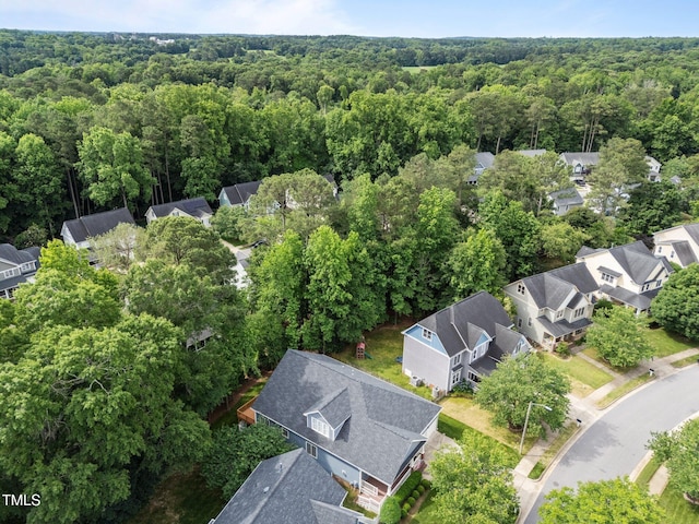 2313 Filigree Ct, Raleigh, NC 27614 - aerial perspective of suburban area with a heavily wooded area