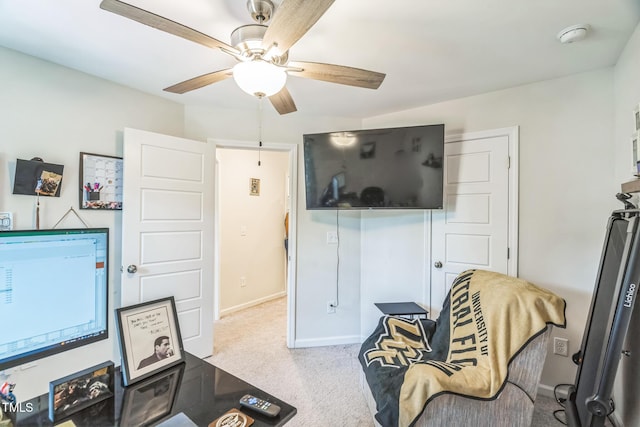 647 N Hardee St, Durham, NC 27703 - workout room featuring a ceiling fan, carpet floors, and baseboards