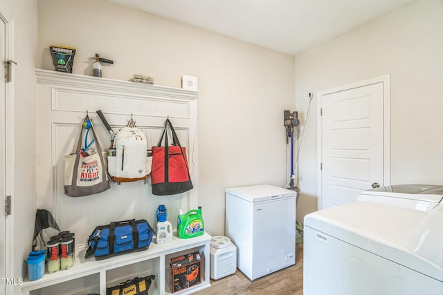 647 N Hardee St, Durham, NC 27703 - laundry area featuring separate washer and dryer and light wood-style floors