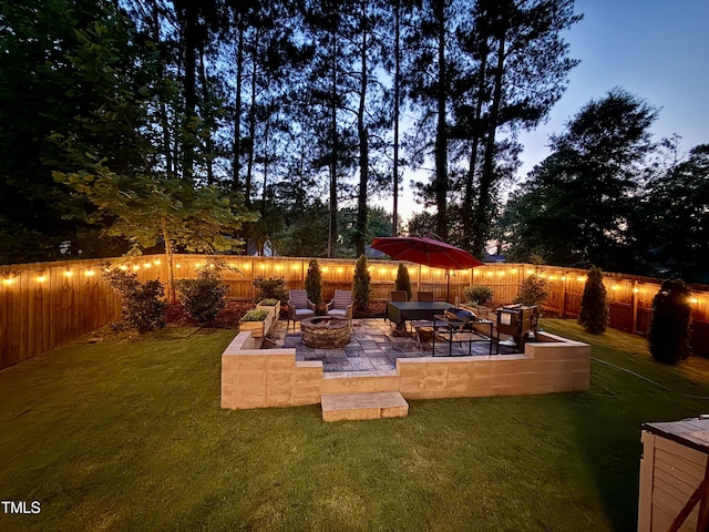 647 N Hardee St, Durham, NC 27703 - view of yard featuring a patio area and a fire pit
