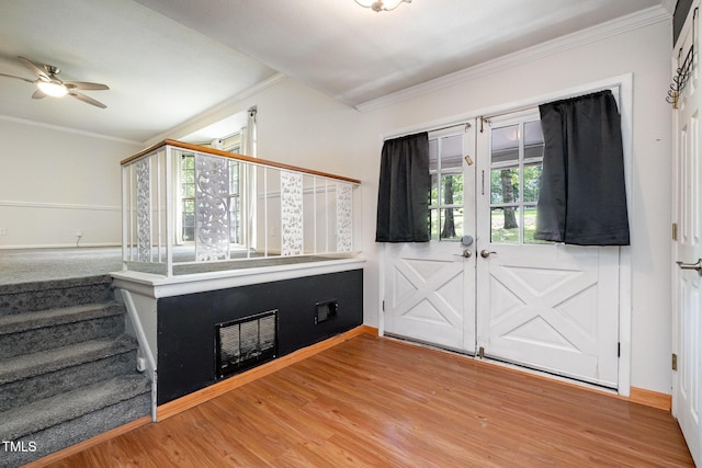 134 Chateau Rd, Durham, NC 27704 - foyer featuring crown molding, ceiling fan, light wood-type flooring, and french doors