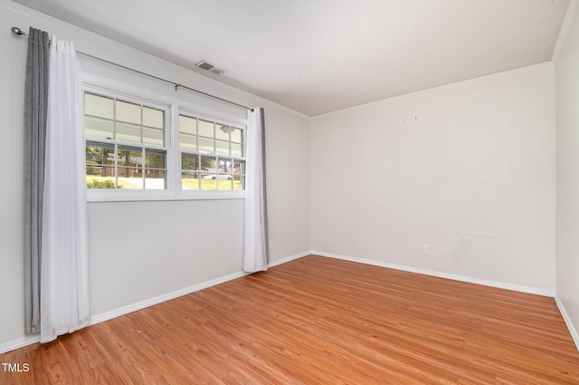 134 Chateau Rd, Durham, NC 27704 - spare room featuring light wood finished floors and baseboards