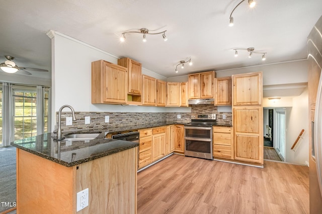 134 Chateau Rd, Durham, NC 27704 - kitchen with double oven range, light brown cabinetry, a sink, a peninsula, and under cabinet range hood