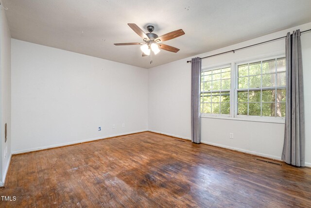 134 Chateau Rd, Durham, NC 27704 - empty room with wood finished floors, ceiling fan, and baseboards
