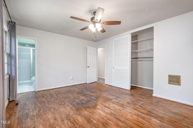 134 Chateau Rd, Durham, NC 27704 - unfurnished bedroom with wood finished floors, baseboards, a closet, ceiling fan, and ensuite bathroom