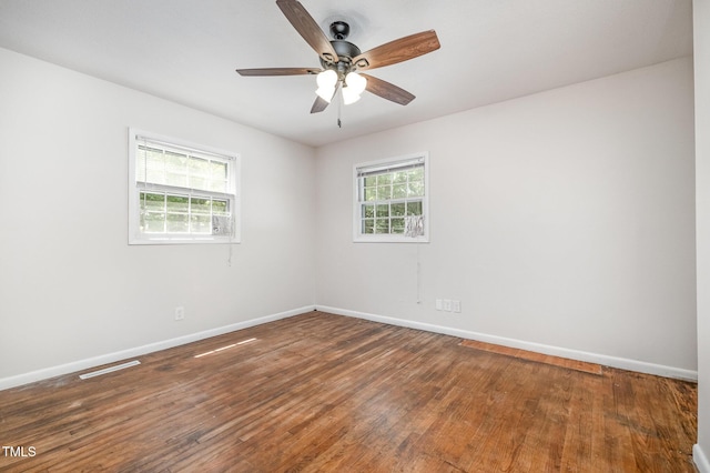 134 Chateau Rd, Durham, NC 27704 - empty room with baseboards, wood finished floors, and a ceiling fan