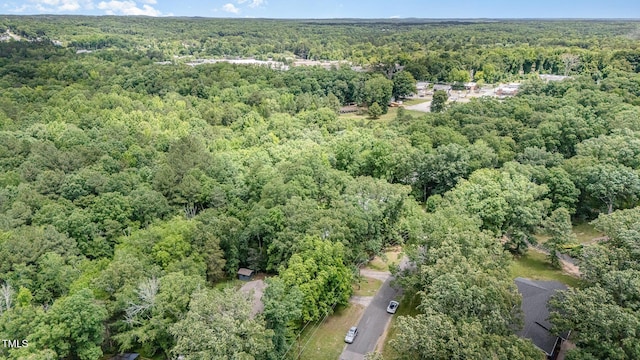 134 Chateau Rd, Durham, NC 27704 - aerial view of property and surrounding area with a forest