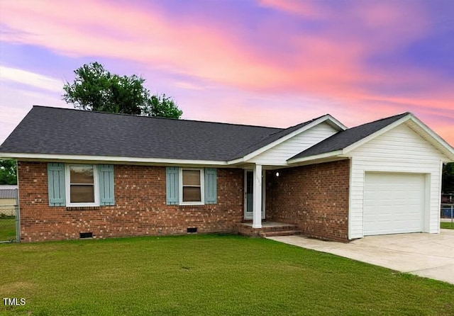 1602 Fairground Rd, Dunn, NC 28334 - ranch-style house with an attached garage, crawl space, driveway, brick siding, and a shingled roof