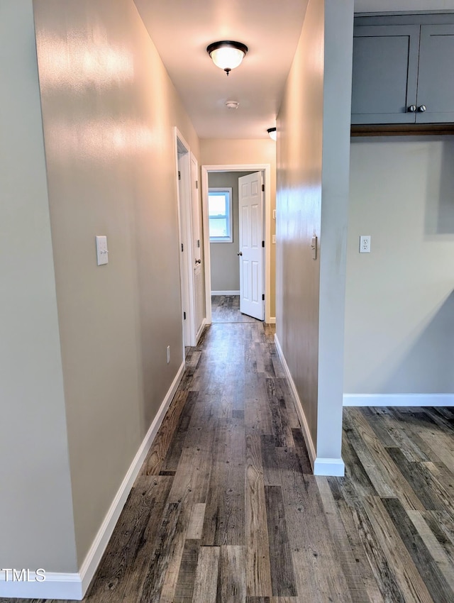 1602 Fairground Rd, Dunn, NC 28334 - corridor with dark wood-type flooring and baseboards