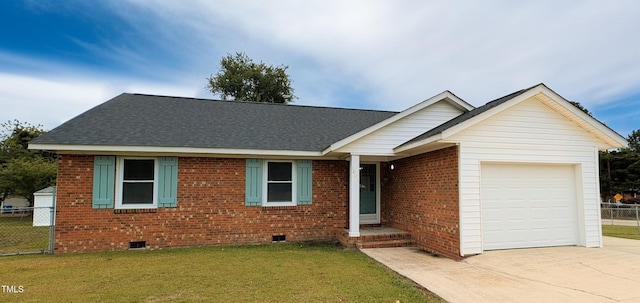 1602 Fairground Rd, Dunn, NC 28334 - ranch-style house with crawl space, an attached garage, concrete driveway, and brick siding