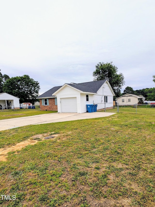 1602 Fairground Rd, Dunn, NC 28334 - view of front of home featuring concrete driveway and an attached garage