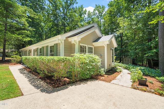 117 Summerlin Dr, Chapel Hill, NC 27514 - view of side of property featuring a shed and a patio area