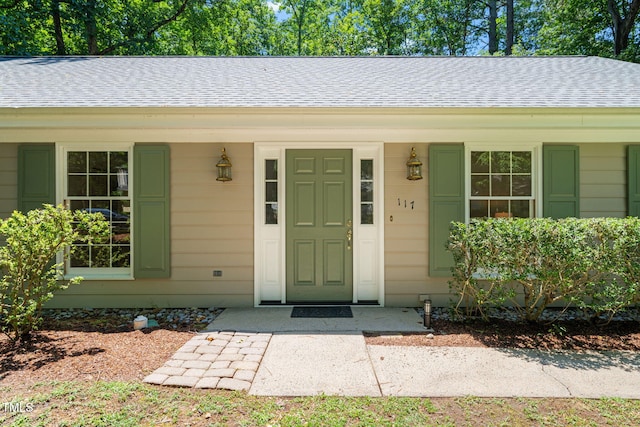 117 Summerlin Dr, Chapel Hill, NC 27514 - entrance to property with a shingled roof and covered porch