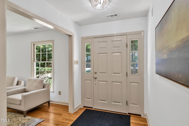 117 Summerlin Dr, Chapel Hill, NC 27514 - foyer with light wood finished floors and baseboards