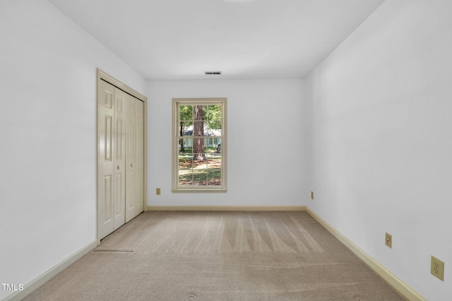 117 Summerlin Dr, Chapel Hill, NC 27514 - unfurnished bedroom with carpet floors and a closet