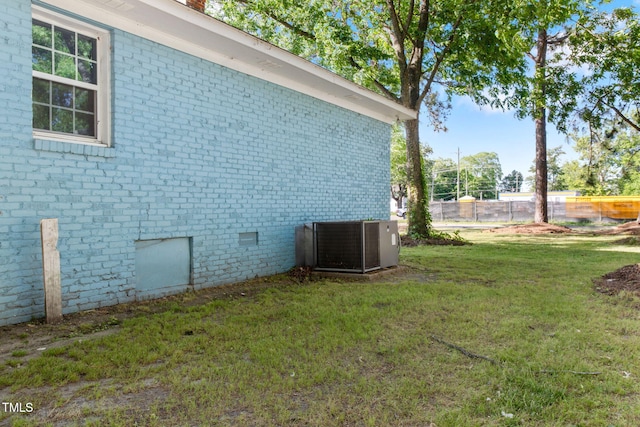 403 S Webb St, Selma, NC 27576 - view of property exterior with central air condition unit and brick siding