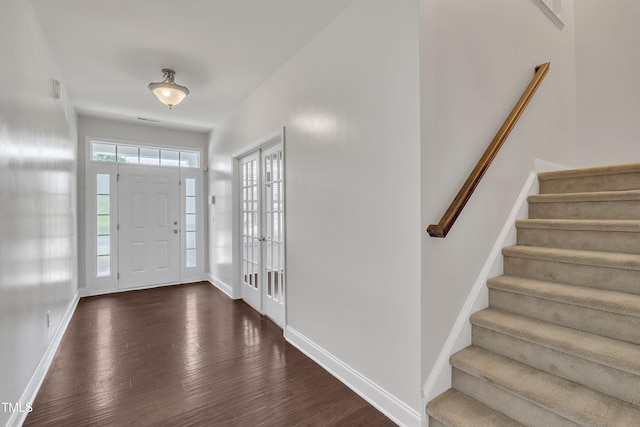 2018 Morehead Hill Ct, Durham, NC 27703 - foyer featuring dark wood finished floors, stairway, and baseboards
