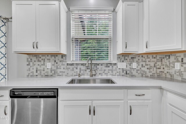 2018 Morehead Hill Ct, Durham, NC 27703 - kitchen with dishwasher, a sink, and white cabinets