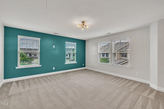 2018 Morehead Hill Ct, Durham, NC 27703 - empty room featuring carpet flooring and baseboards