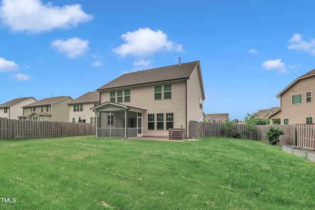 2018 Morehead Hill Ct, Durham, NC 27703 - back of house featuring a sunroom, a residential view, and a patio