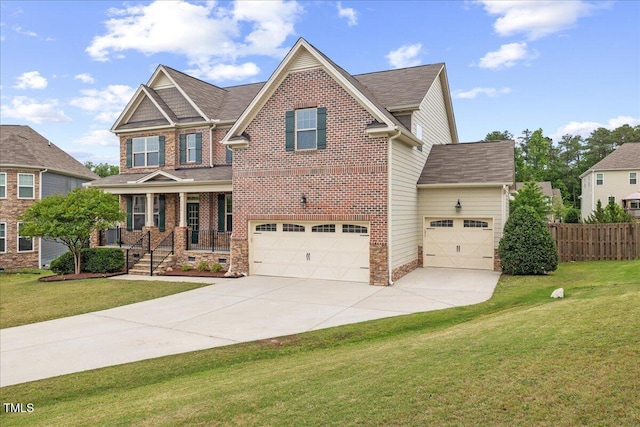 1704 Fawn Chase Ct, Wake Forest, NC 27587 - craftsman-style home with concrete driveway, brick siding, covered porch, and an attached garage